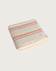 Købn Sand Towel featuring raw edge fringing folded