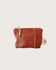 Kobn Tamarillo Towelling pouch with stripes and gold zip with cream zip pull.
