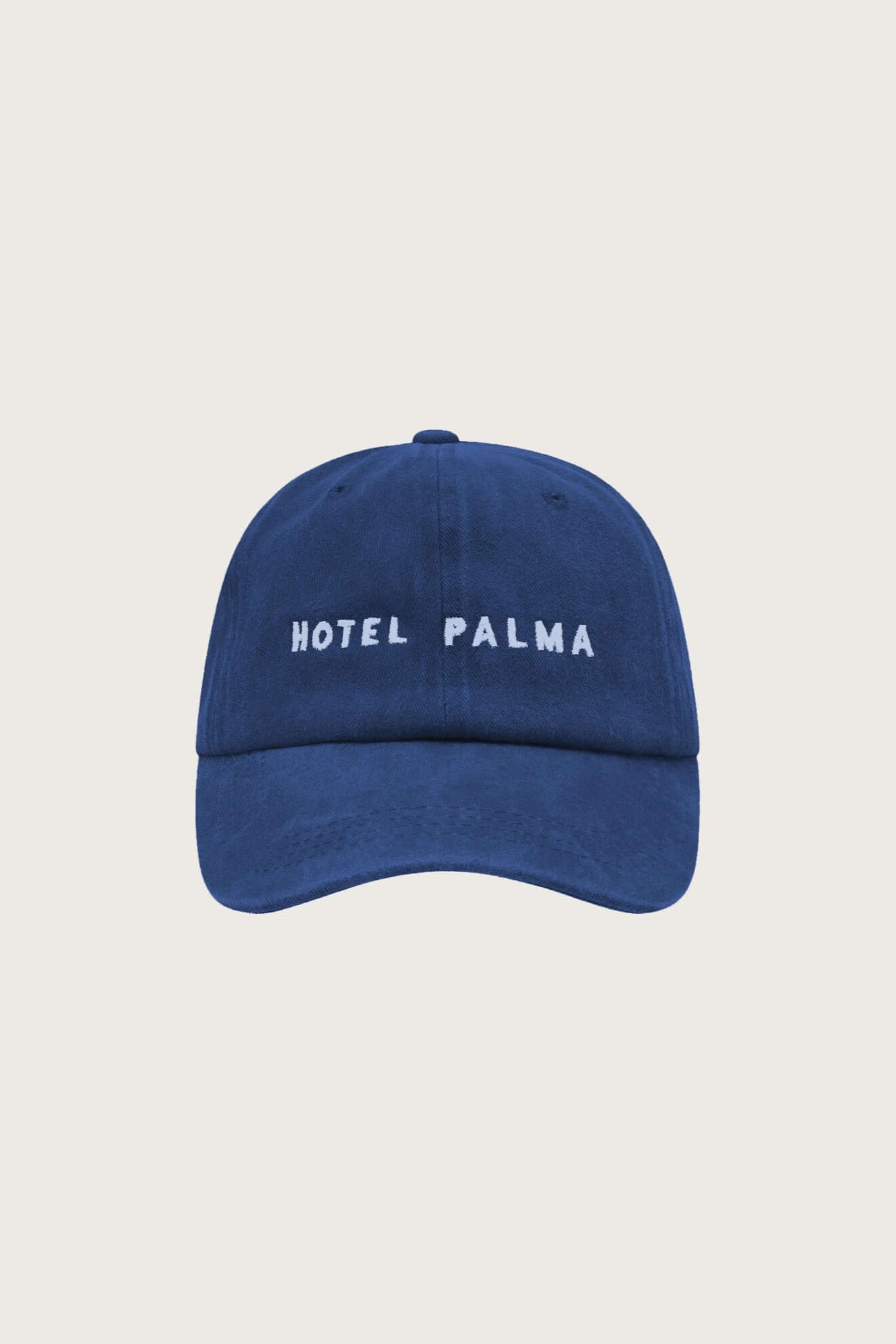 Little Palma cotton blue cap with words Hotel Palma embroidered on the front. 