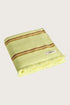 Købn Citrus Towel featuring raw edge fringing folded 