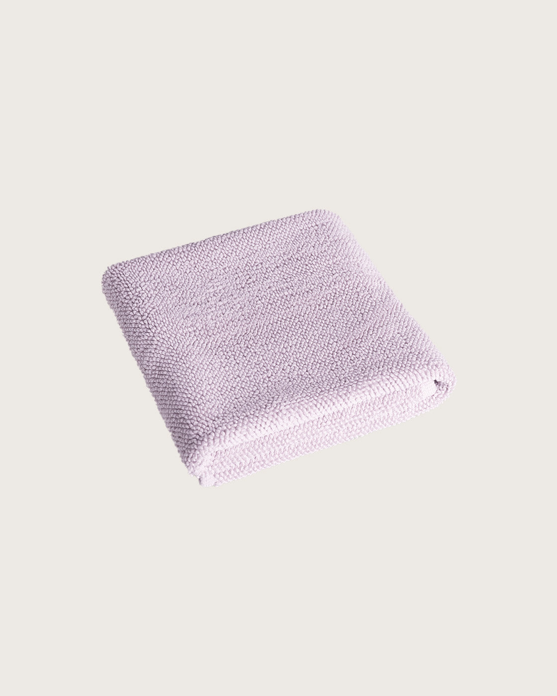 Købn Lilac Bathmat folded with a plush pile chunky cotton weave