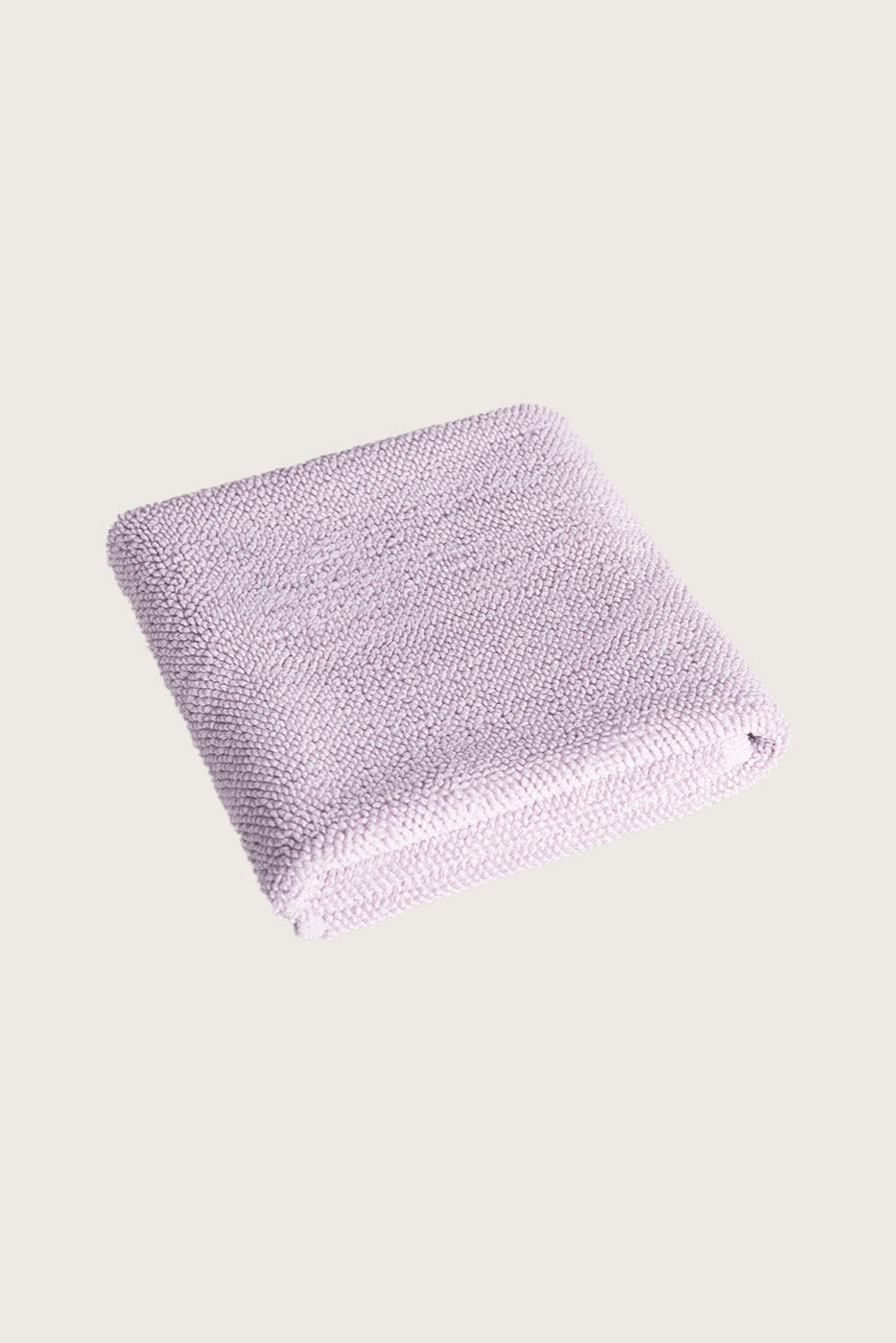 Købn Lilac Bathmat folded with a plush pile chunky cotton weave