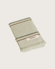 Købn Matcha Hand Towel featuring raw edge fringing folded 