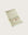 Folded mint hand  towel with stripes and 'kobn' branding on a light beige background