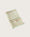 Folded mint hand  towel with stripes and 'kobn' branding on a light beige background
