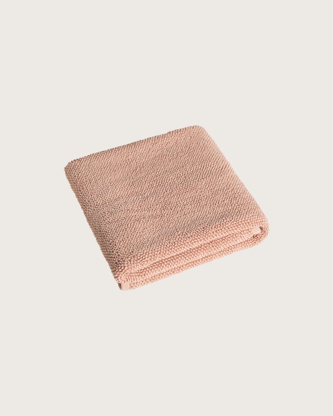 Købn Nougat 
Bathmat folded with a plush pile chunky cotton weave