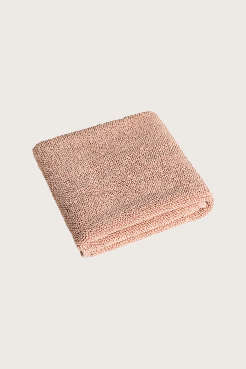 Købn Nougat 
Bathmat folded with a plush pile chunky cotton weave