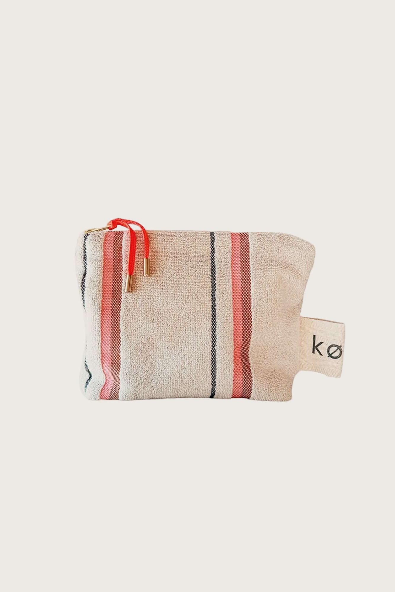 Kobn Sand Small Pouch with stripes for travel, to use in your bag, or as a clutch.