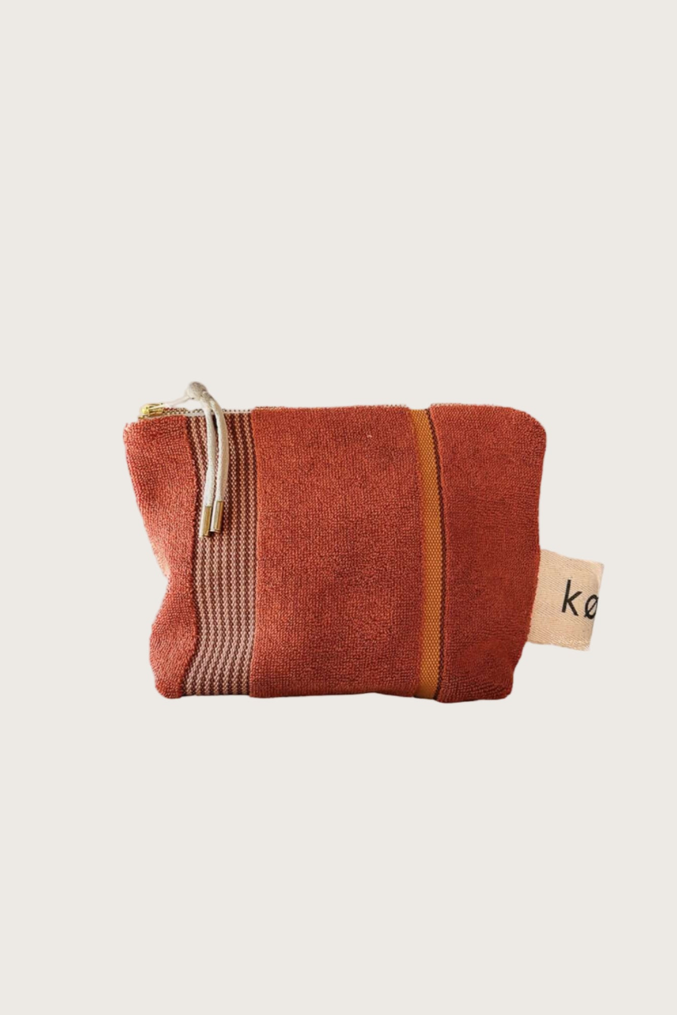 Kobn Tamarillo Towelling pouch with stripes and gold zip with cream zip pull. 