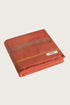 Købn Tamarillo Towel featuring raw edge fringing folded 