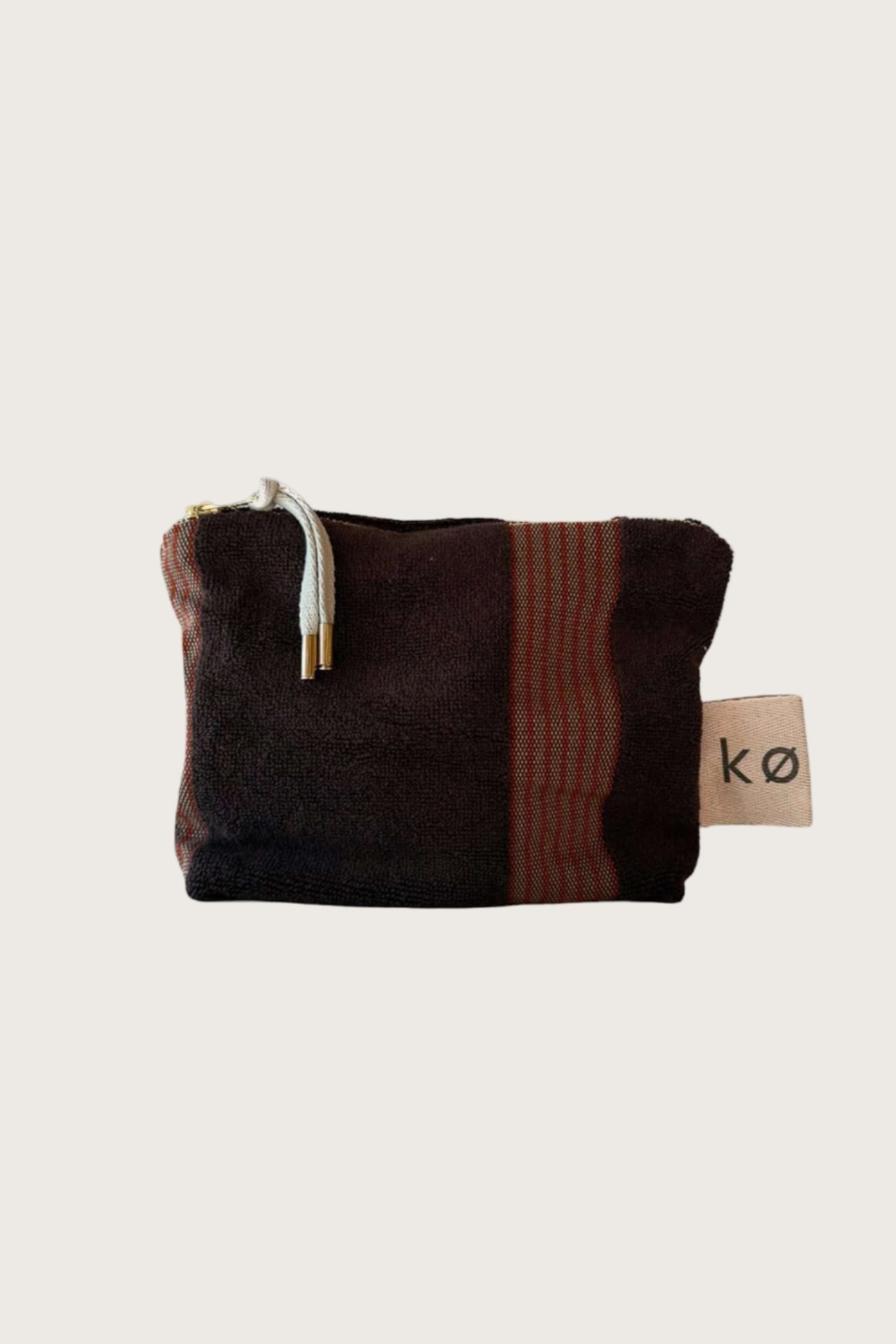 Kobn Umber towelling pouch with stripes, a herringbone label and feature zip tassle. 
