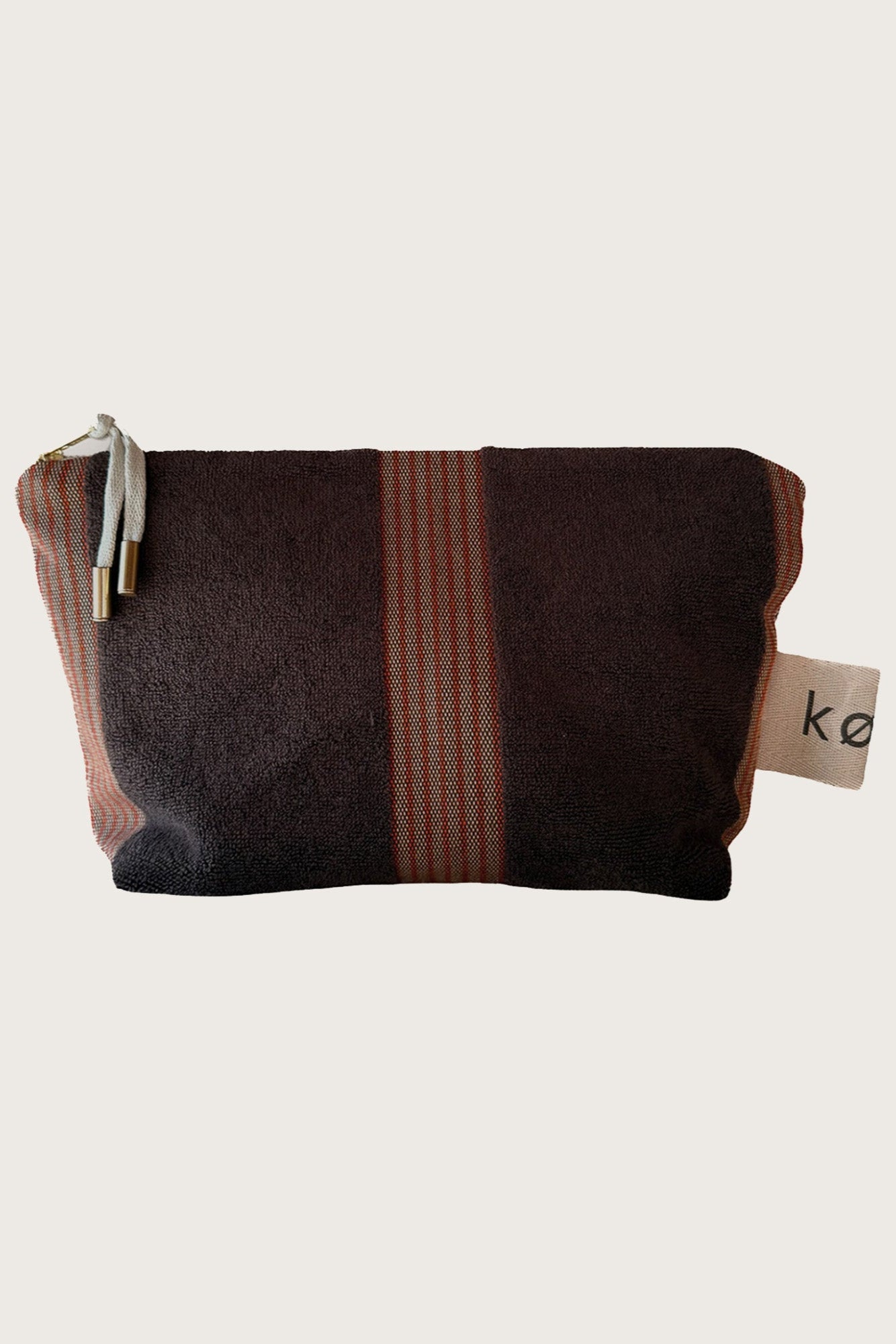 Kobn Umber Towelling pouch with gold zip  to use in your tote bag, travel or as a clutch. 