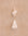 Chunky textured cotton bathmat in sand colour with two shells on top. 