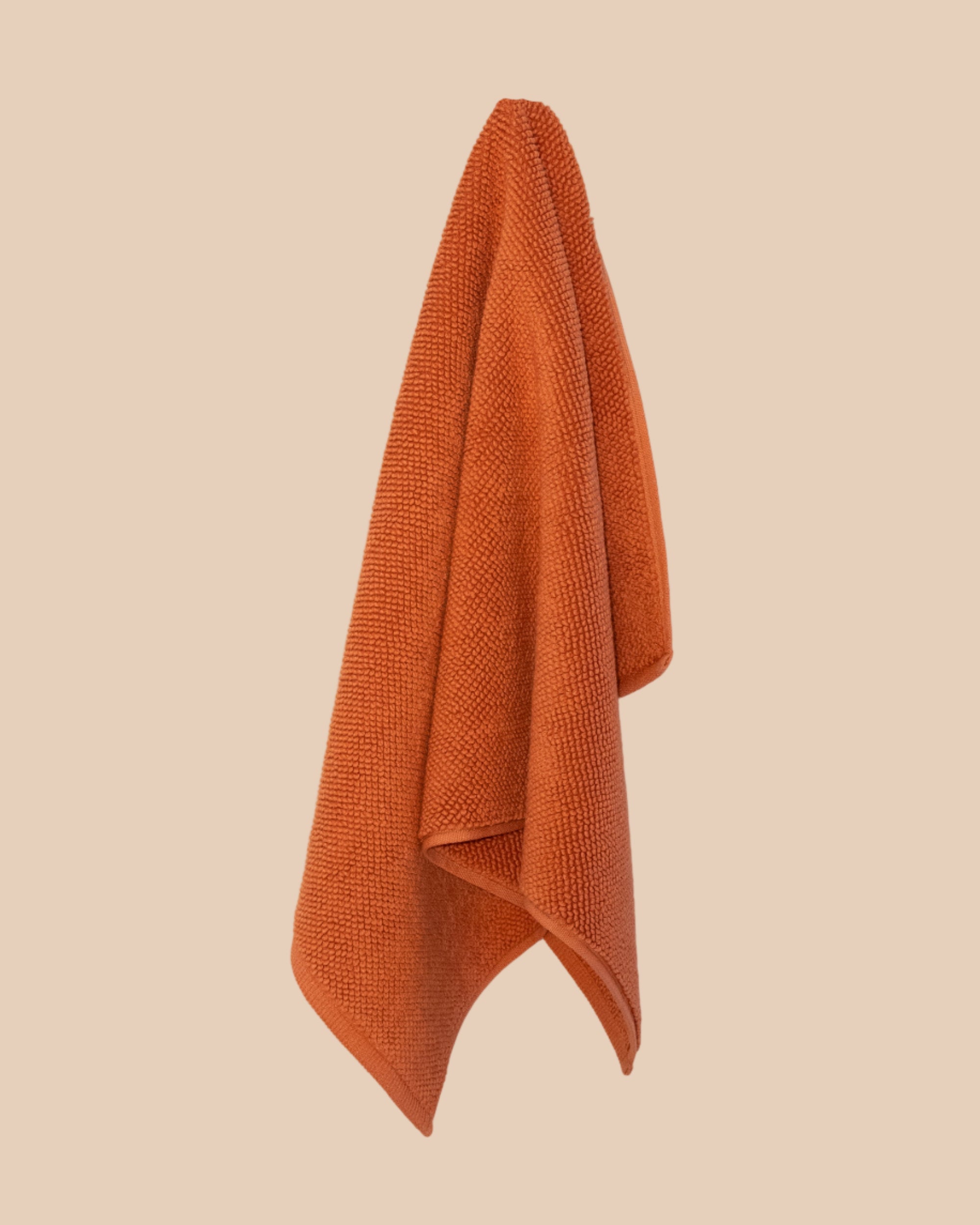 Chunky cotton weave bathmat in tamarillo colour