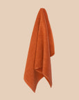 Chunky cotton weave bathmat in tamarillo colour