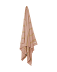 Pink towel with tonal brown stripes on a white background