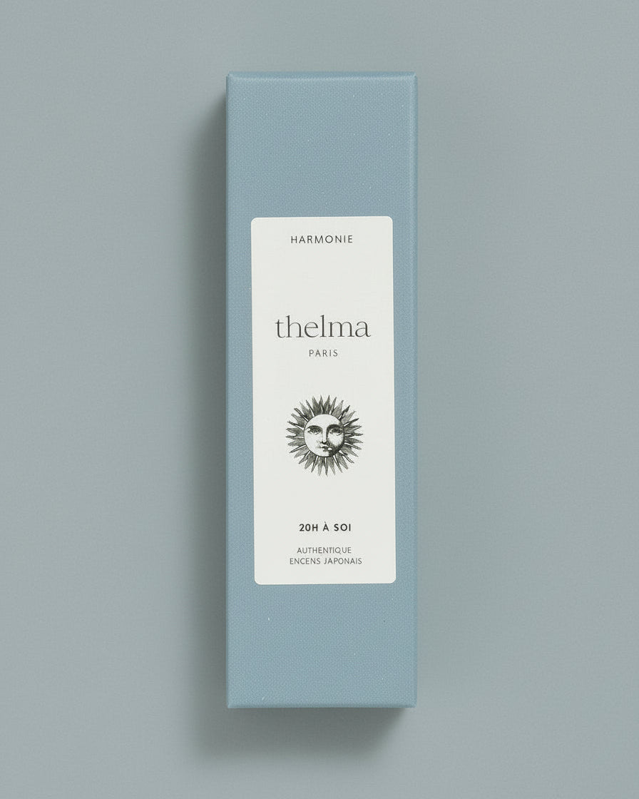 Blue box with 'thelma' branding on a gray background